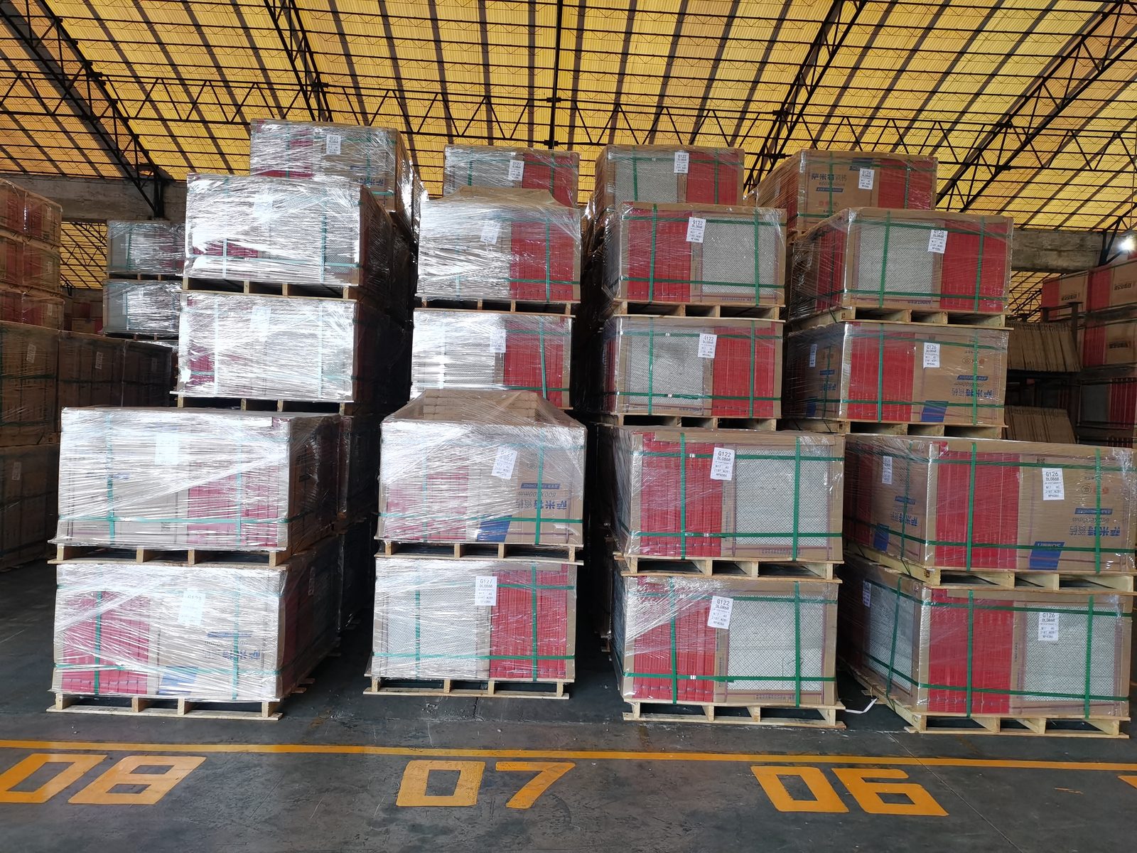 Loaded pallets ready for shipment — 200+ containers handled per year